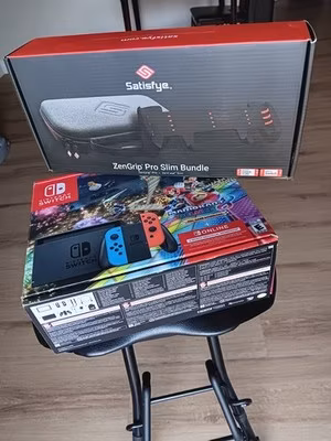 Nintendo Switch (All Original Equipment And Packaging) + ZenGrip Pro Slim Bundle