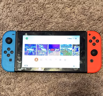 Nintendo Switch Handheld Console w/ Neon Red/Blue Joy-Con, 32GB 720p Touch