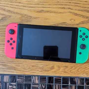 Nintendo Switch Console 32GB w/ Neon Red & Neon Green Joy-Con, Launch Edition