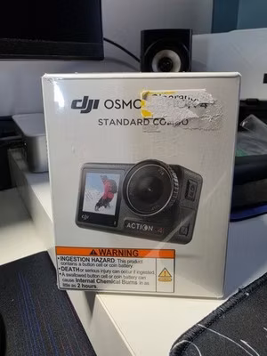 NEW DJI Osmo 4 Standard Combo Action Camera: 4K UHD, 10MP, 64GB - SEALED