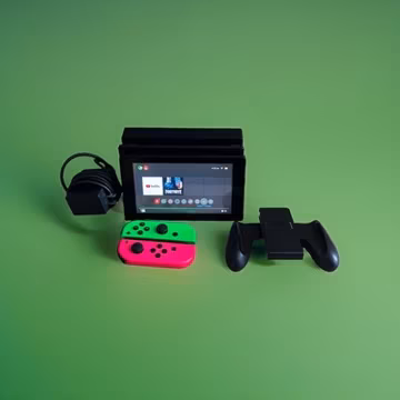 Nintendo Switch 32GB 1080p Wi-Fi Console w/ Neon Blue/Red Joy-Con Dock Grip
