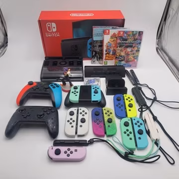 Nintendo Switch Console HAC-001 w/ Joy Cons, Docks, Power, Amiibo, Games, Case