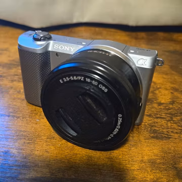 Sony Alpha a5000 20.1MP Mirrorless Silver Wi-Fi Flash w/ 16-50mm Lens