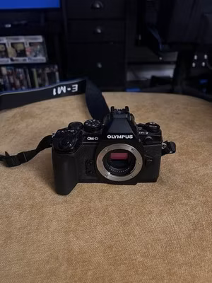 OLYMPUS OM-D olympus Mirrorless Digital Camera W/ 50mm f1.8 Lens.