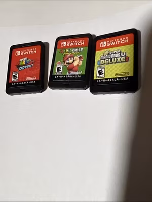 (3) Nintendo Switch Games (Mario Golf Super Rush Cartridge ,Deluxe,odyssey