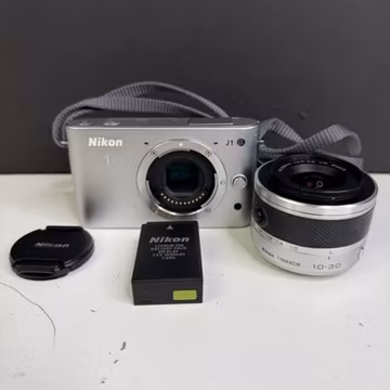 Nikon 1 J1 10.1MP Mirrorless Camera Silver w/ 10-30mm f/3.5-5.6 VR Lens - WORKS!