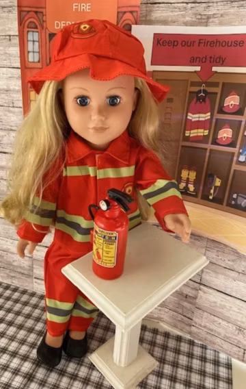 18" doll firefighter outfit: Includes pants, shirt, hat, & mini fire extinguisher