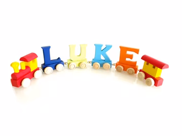 Personalised name with wooden toy train, wooden letters used to spell your child's personalised name