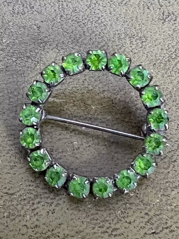 Metal and green glass