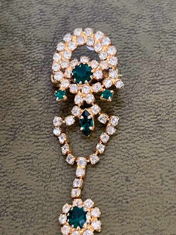 pretty metal and glass waterfall brooch