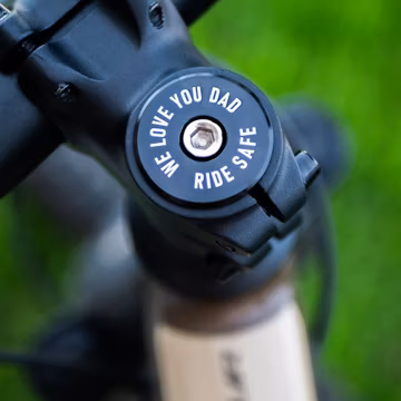Legit Headset Caps brand custom headset cap for bicycle with laser etched "We Love You Dad, Ride Safe", universal size fits most bikes