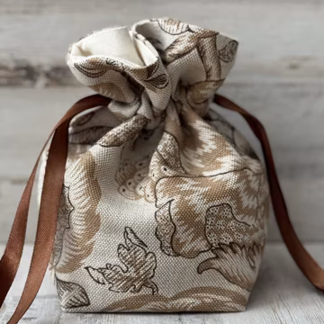 Lined and Box Pleated Camel and Flax Floral Drawstring Bag