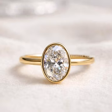 2 CT Oval Moissanite Engagement Ring: Bezel Set 14k Gold Solitaire