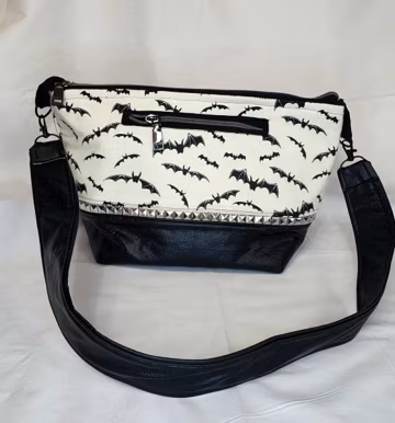 Cream bats Purse with studs and pleather