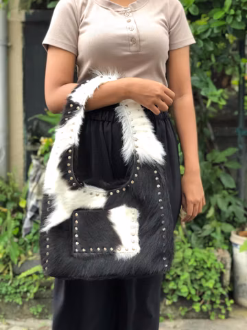 Cowhide fur shoulder bag