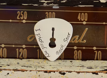 I picked my Rock Star Guitar Pick with Rocking Guitar Cut Out in Aluminum