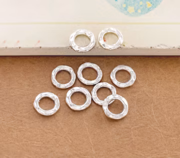 10 of Karen Hill Tribe Silver Hammer Closed Jump Rings 8mm. :ka4425