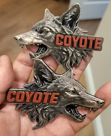 3D Sculpted Coyote Emblem Pair: Antique Silver & Red Lettering Truck Badge